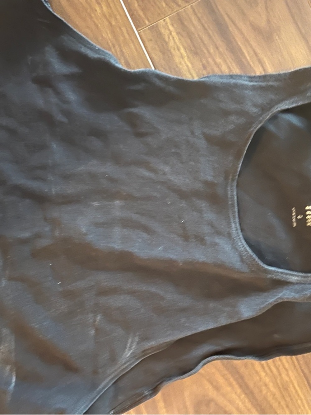 TNA cropped black muscle tank